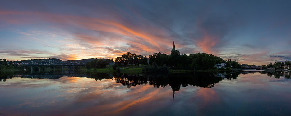 Panorama from Nidelven river. Viewing the Nidaros Cathedral in sunset