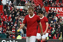 Paul Scholes and Owen Hargreaves in 2008, wearing 1958-style Manchester United kits to mark the 50th anniversary of the Munich air disaster Paul Scholes vs Man City.jpg