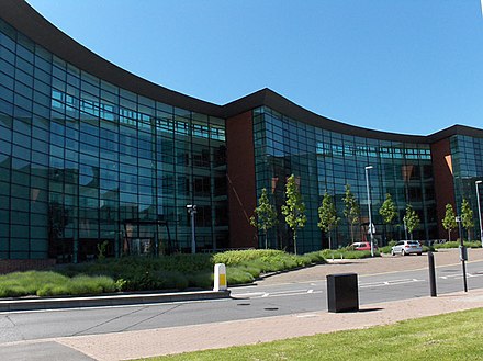 Reading International Business Park. This crescent of offices beside the A33 are home to Verizon, a telecommunications company. They were formerly the European headquarters of WorldCom before its demise