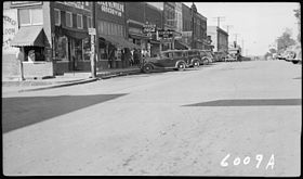 Riley and Wolfe Grocery, Morgan's Shoe Store and other businesses - NARA - 280607.jpg