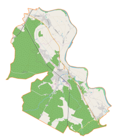 Mapa konturowa gminy Rudnik nad Sanem, w centrum znajduje się punkt z opisem „Nowy cmentarz żydowski w Rudniku nad Sanem”