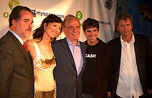 Oxfam America president Raymond C. Offenheiser, Wendi Deng and Rupert Murdoch with MySpace co-founders Anderson and DeWolfe at the 2006 Oxfam/MySpace Rock for Darfur event Rupert Murdoch Wendi Deng2.jpg