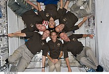 The crew of STS-124 inside the pressurized Kibo module. STS-124 crew in Kibo.jpg