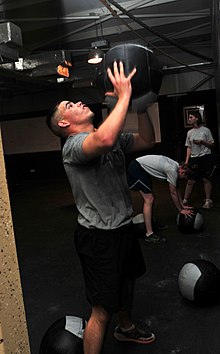 220px-Soldier_tosses_a_medicine_ball_while_working_out_DVIDS462753.jpg