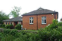 This church hall stands next to the church. St Symphorian's Church Hall, Durrington Hill, Durrington (May 2013).JPG