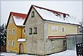 House, side building and gate of a small courtyard