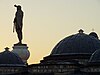 Philip II monument visible above the Daut Pasha Hamam