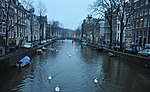 Thumbnail for File:Swans in a canal (5822070926).jpg