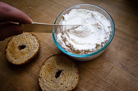 A toasted bagel with cream cheese
