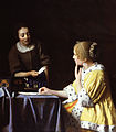 Johannes Vermeer, Vrouw en dienstbode met brief, 1666