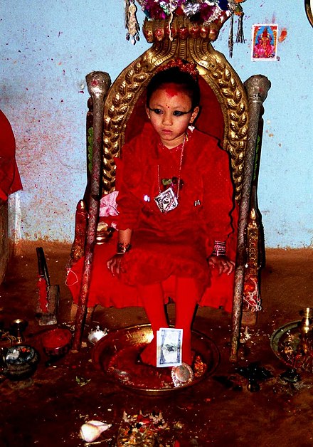 A Nepali girl being worshipped as a living Goddess, called a kumari