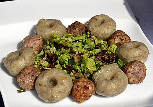 Kluski śląskie (silesian potato dumplings) served with meat balls