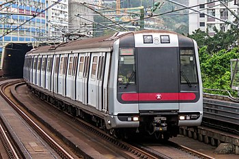 An Metro Cammell electric multiple unit running on the Tsuen Wan line A164 entering Kwai Hing Station (20190301143013).jpg