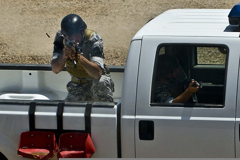 File:An Iraqi policeman engages a simulated enemy during a tactical demonstration held at the Iraqi National Police Special Training Academy in Baghdad, Iraq, July 16, 2011 110716-A-LZ835-065.jpg