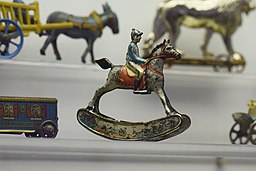 Antique tin toy jockey on rocking horse (25868118450)