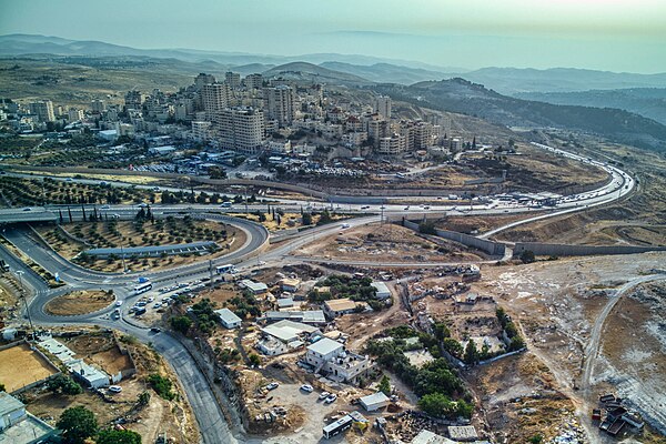 the village az-Za'ayyem and the az-Za'ayyem Checkpoint on Highway 1, near the Israeli West Bank barrier