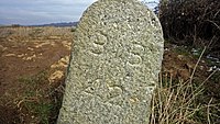 Inscribed with 'BB 42' (Bexhill Borough). At the time of the incorporation of Bexhill Borough in 1902, the boundary was marked out by 63 large stones placed along the perimeter from Normans Bay on the west, through Lunsford Cross on the north of the town and Glyne Gap on the east, also the Hastings county borough boundary.