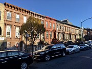 Masonry (brick?) row houses in Bedford-Stuyvesant, in Brooklyn. These do not seem to be the "Tapestry brick houses" of the dissertation.