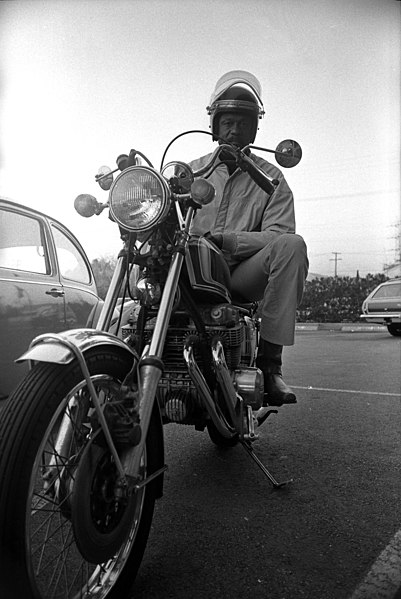 File:Bill Russell seated on motorcycle.jpg