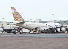 A PIA Boeing 747–300 painted in a Frontier livery