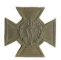 Bronzen Kruis Spink voorzijde