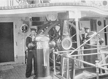 Aft quarterdeck, right rear of views above; double wheel and Nelson's Trafalgar signal on fore edge of poop deck Calliope wheel.jpg