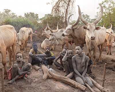 Group of Mundari kids with cow dong ashes in a cattle camp in Terekeka, South Sudan.
