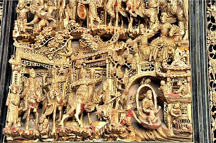 Teochew woodcarving products are frequently painted gold.