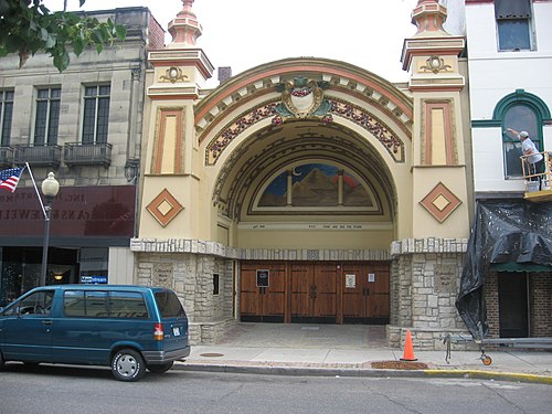 The façade of the historic Columbia Music Hall, the only portion remaining after a fire in 2007, rebuilt in 2012 as the open air Columbia  Music Arena.[73]