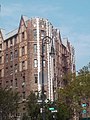 A corner view of The Lenru. The apartment was built in 1928 and reflects Jacobethan styled architecture with strong Tudor revival accents.