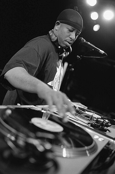 The track "Everything I Am" features turntable scratches by famed record producer DJ Premier