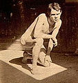 Eakins, Thomas (1844-1916) - 1885 ca. - Male nude crouching in sunlit rectangle in Pennsylvania Academy studio.jpg