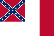 Third flag of the Confederate States of America, known as the "Blood Stained Banner". A white field with a "Southern Cross" in the upper hoist canton (at top left in this image) and and vertical red bar at the fly end (at right in this image). The Southern Cross in the canton is a red field with a blue diagonal cross and stars within the cross itself.