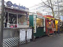 An E-san Thai Cuisine food cart and others at the pod in 2013