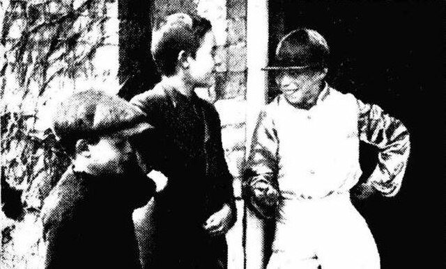 Formby while employed as a jockey, aged 10 in 1915