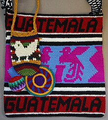 Bags and a hacky sack tapestry crocheted for tourists in Guatemala. GuatemalaTapestryCrochet.jpg