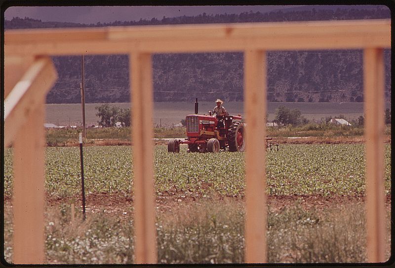 File:HOUSING DEVELOPMENT ENCROACHES UPON FARM LAND - NARA - 543667.jpg