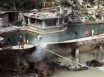 Tourists and pilgrims having a bath in a hot spring in Gurudwara Complex, Manikaran in Uttrakhand state of India, c. May 2009. Hot springs at Manikaran,Himachal Pradesh.jpg