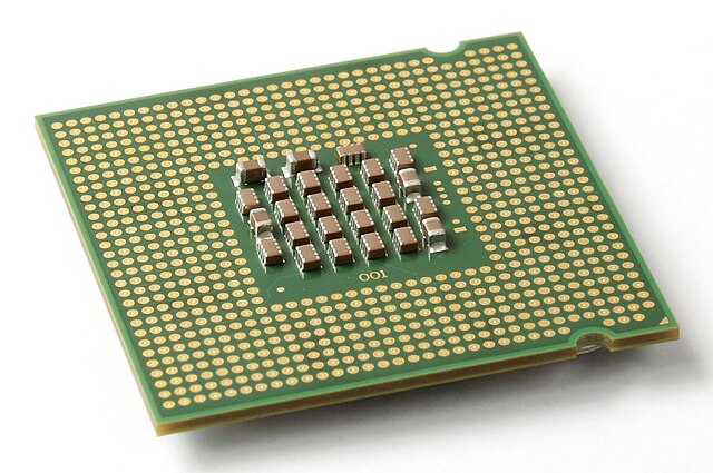 The LGA 775 package of a Pentium 4 Prescott CPU.