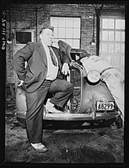 Irwin R. Steffy having his car gone over in the Pierson Motor Company garage
