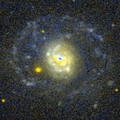 M77 en ultraviolet par le télescope spatial GALEX.