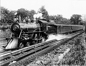 Engine 999 as it leads the Empire State Express through Palatine, New York in 1905. NYC 999.jpg