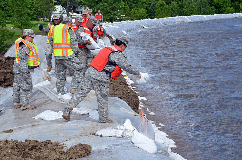 File:National Guard Soldiers place sandbags and poly.jpg