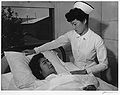 Nurse Aiko Hamaguchi and patient Toyoko Ioki, Manzanar Relocation Center, California.jpg
