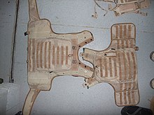 Unassembled Osprey Mk 2 body armour. The wrap around fasteners clearly visible on the rear half (left) were introduced on the Mk 2 covers and help provide the wearer with a more secure and comfortable fit. Osprey split COB2009.jpg