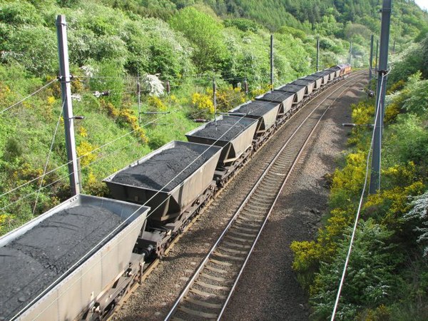 A merry-go-round train hauled by a Class 66 locomotive