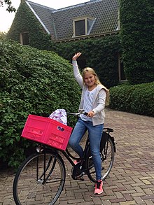 Catharina-Amalia, Princess of Orange, on a bicycle, on her way to school (2015) Princess Amalia of the Netherlands on a bike.jpg