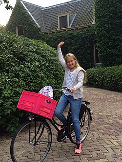 Princess Amalia of the Netherlands on a bike.jpg