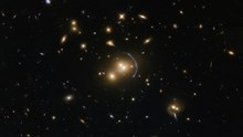 Galaxy cluster SDSS J1152+3313. SDSS stands for Sloan Digital Sky Survey, J for Julian epoch, and 1152+3313 for right ascension and declination respectively. Probing the distant past SDSS J1152+3313.tif