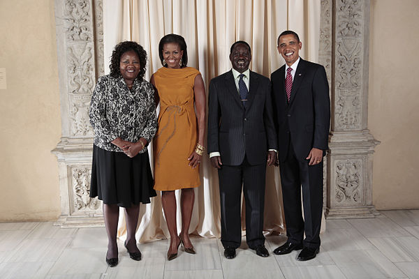 President Barack Obama and First Lady Michelle Obama of the United States pose for a photo during a reception at the Metropolitan Museum in New York w